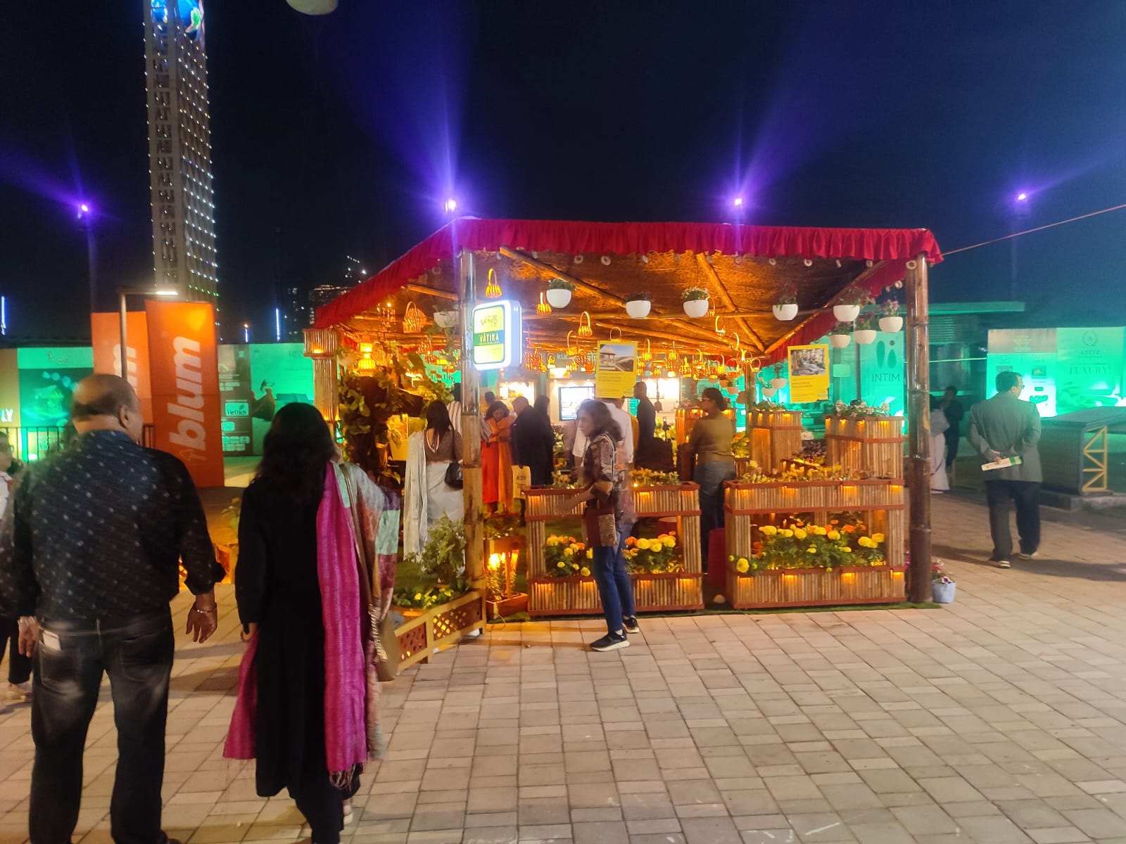 Night five — finished pavilion with visitors browsing inside